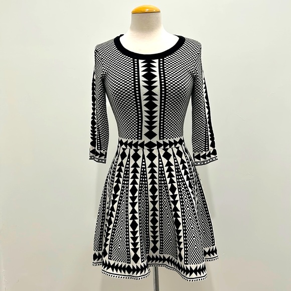 Nina Leonard Dresses & Skirts - BLACK AND WHITE MINI DRESS WITH PLEATED SKIRT, SIZE SMALL, 3/4 LENGTH SLEEVE